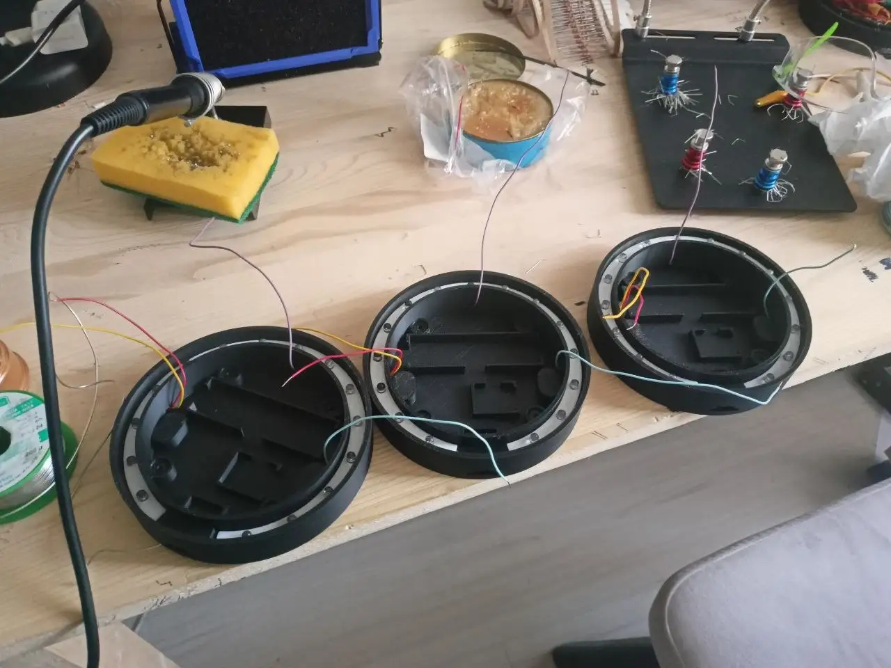 Empty 3D-printed shells on the workbench